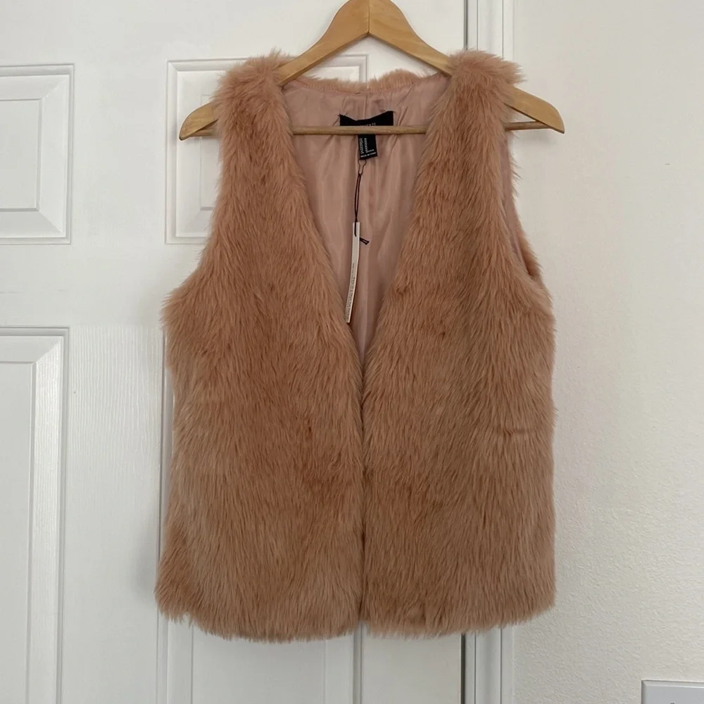 Forever 21 NWT faux fur soft pink vest.